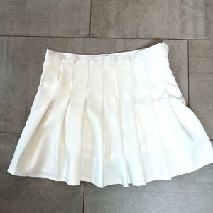 Fun white pleated skort (attached shorts under skirt) needs to be in your closet